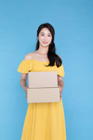 shopping event concept, beautiful Korean Asian woman with delivery box