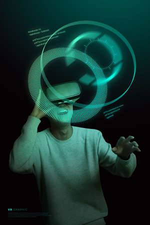 person wearing VR gadget, neon dark graphic in virtual reality conceptの写真素材