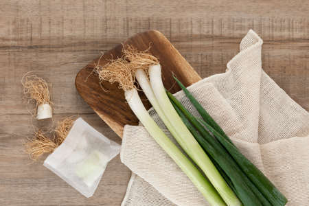 green onion on a white clothの写真素材