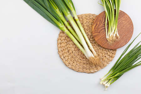 Green Onion on a Wooden Trayの写真素材