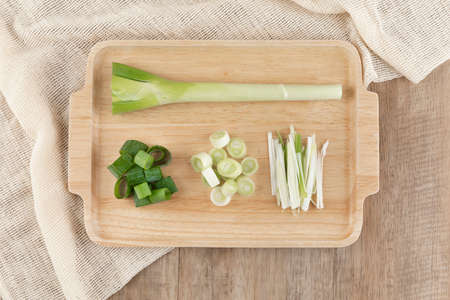 chopped green onion on tray
