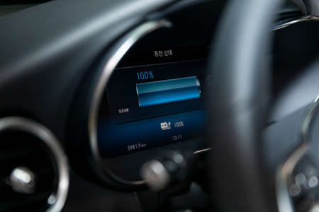 inner view of electric car being charged