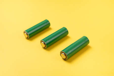 Three green eco batteriesの写真素材