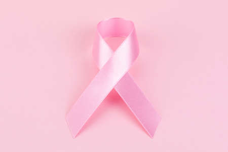 pink ribbon on pink backgroundの写真素材
