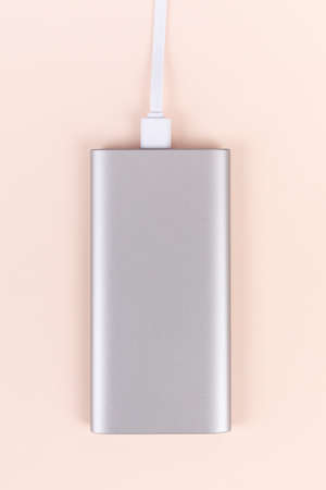 portable power bank, pink background