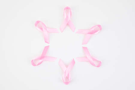 Pink ribbons on a white backgroundの写真素材