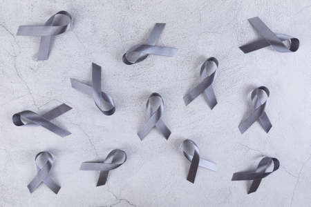 Gray ribbon on cement backgroundの写真素材