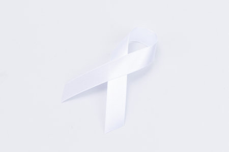White ribbon on white backgroundの写真素材