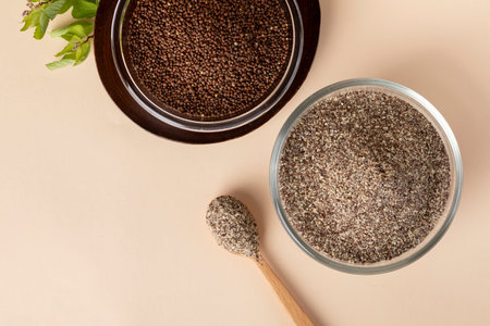 perilla seed and powder in glass bowlの写真素材