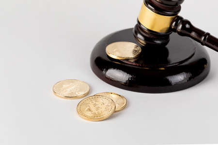 bitcoin and gavel, cryptocurrency crime concept