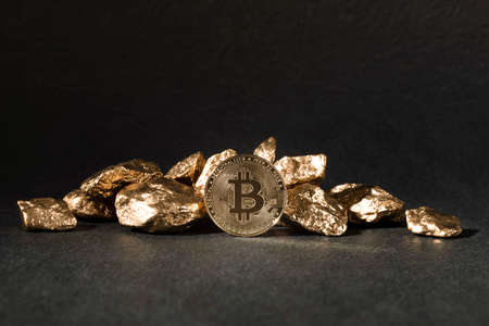 golden bar and bitcoinの写真素材