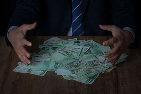 business crime concept, handcuffed criminal in suit