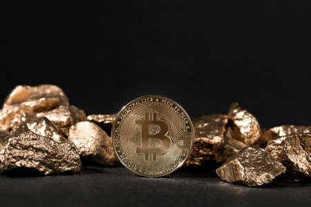 golden bar and bitcoin