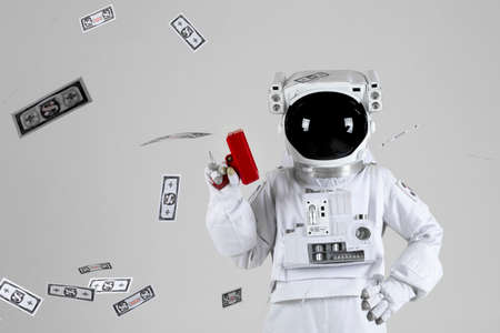 Astronaut with money gun, white background