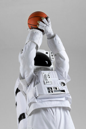 astronaut playing basketball, white background