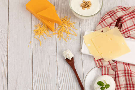 milk and yogurt cheese collection, white wood backgroundの写真素材