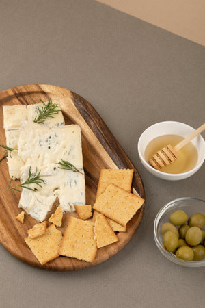 gorgonzola cheese and honey biscuits, brown backgroundの写真素材