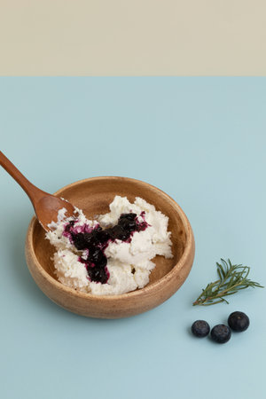 blueberry on greek yogurt, pastel backgroundの写真素材