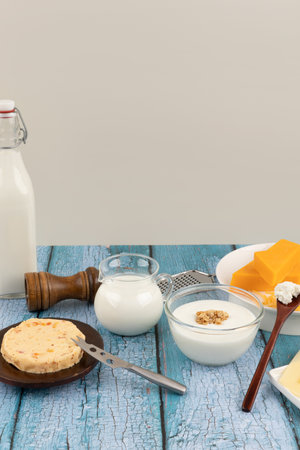 blue wood background, a collection of milk and yogurt cheese collectionの写真素材