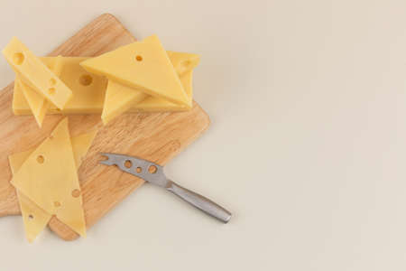 emmental cheese on the beige plateの写真素材