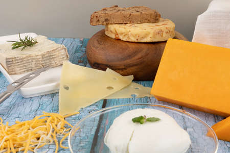 cheese collection, blue wood background