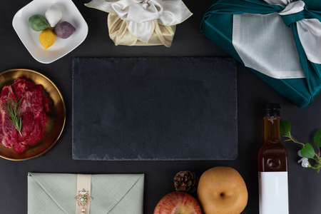Korean holiday Chuseok and Seol gift set of apple, pear, rice cake, beef in wrapping clothの写真素材