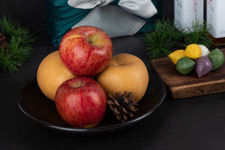 Korean holiday Chuseok and Seol gift set of apple, pear, rice cake, beef in wrapping cloth