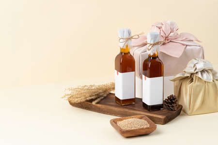 Korean traditional gift set wrapped in silk with premium sesame oilの写真素材