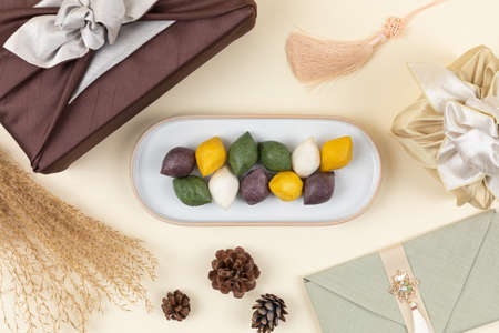 Korean traditional food gift set, songpyeon rice cake with pine cone and needlesの写真素材