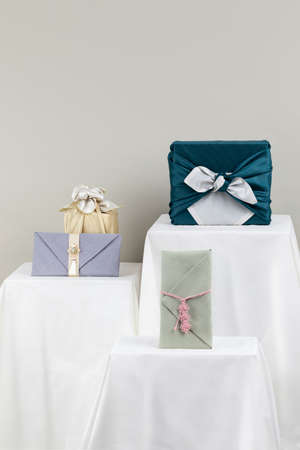 Korean holiday gift concept, gift box wrapped in silk cloth, money envelope in Hanjiの写真素材