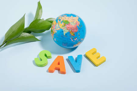 protect earth and environment concept, esg wooden box and plantの写真素材