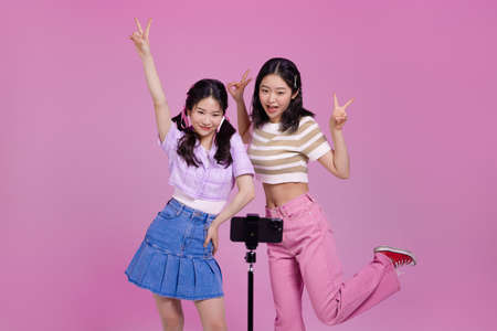 mz generation Asian Korean female hipster influencer, creator concept : creating short form video contentの写真素材