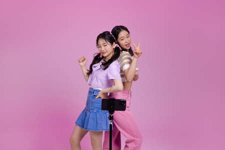 mz generation Asian Korean female hipster influencer, creator concept : creating short form video contentの写真素材