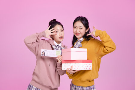 mz generation Asian Korean female hipster influencer, creator concept : with gift boxes and examinationsの写真素材