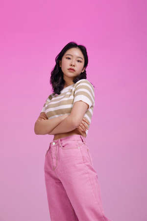 mz generation Asian Korean girl in confident poseの写真素材