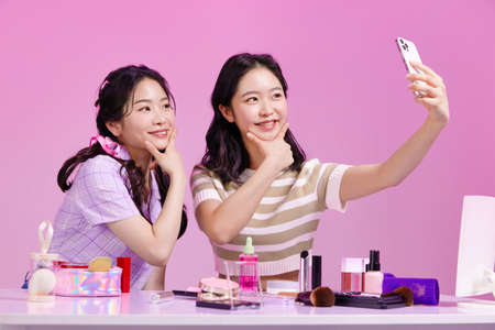 mz generation Asian Korean female hipster influencer, creator concept : taking selfiesの写真素材