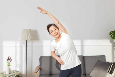 Asian Korean senior woman, home training fitnessの写真素材