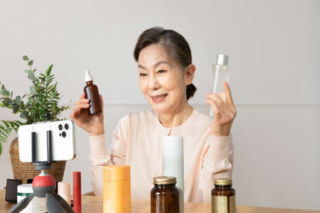 Asian Korean senior woman beauty creator, influencer, vlogger conceptの写真素材