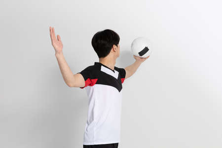 volleyball sports player, asian korean man preparing serve, serving the ball