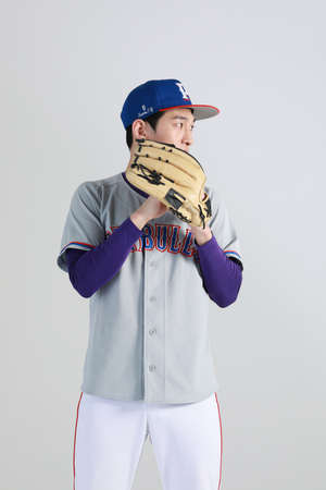 baseball sports player, asian korean man with motionsの写真素材