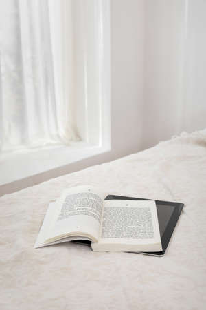 relax cozy objects and background with a book, beddingの写真素材