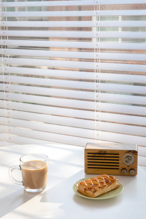 relax cozy objects and background with milk tea, pie, radioの写真素材