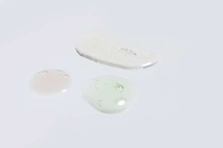 isolated smear beauty cosmetics texture of face ample, white background
