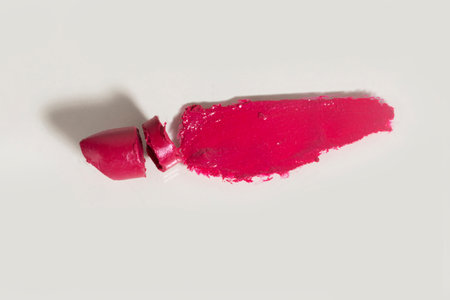 isolated smear beauty cosmetics texture of lipstick, white backgroundの写真素材