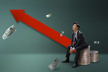 graphic poster of rise in interest rates, Korean young business man struggling with the loan interestの写真素材