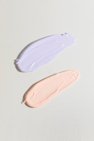 isolated smear beauty cosmetics texture of makeup base, white backgroundの写真素材