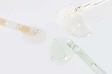 isolated smear beauty cosmetics texture of face ample, white backgroundの写真素材