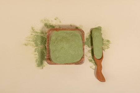 Matcha green tea powder and tea spoonの写真素材
