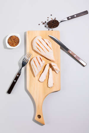 roasted chicken breast and sauce, white backgroundの写真素材