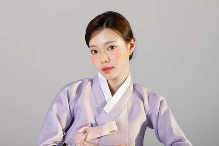 spring beauty concept, beautiful korean woman wearing hanbokの写真素材